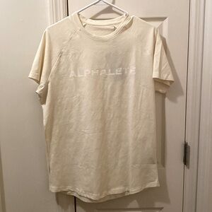 Alphalete cream shirt. Super soft and stretchy. New with tags.